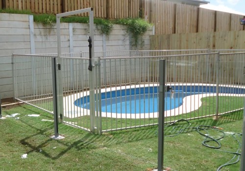 How to install glass pool fence on grass?